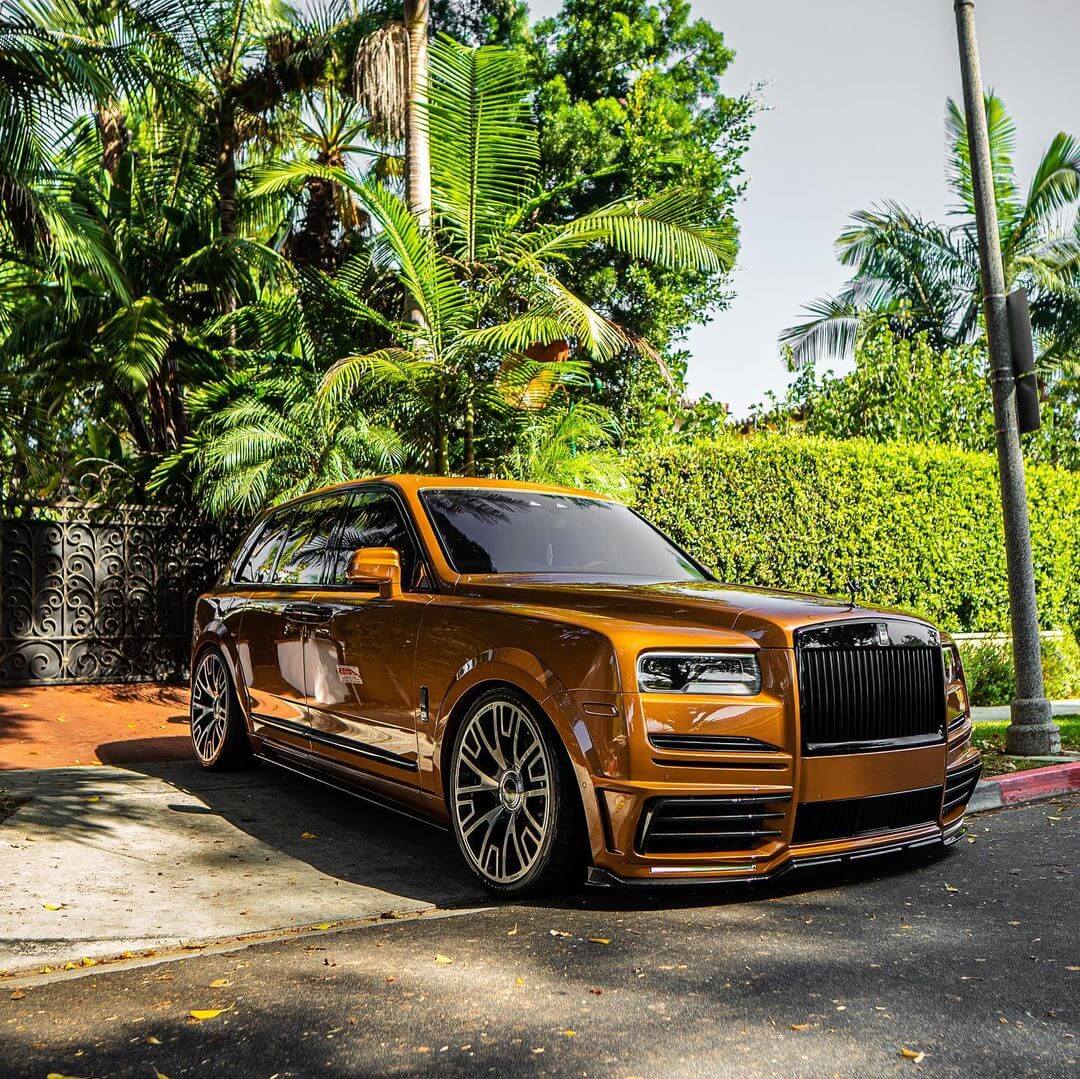 Rolls Royce Cullinan If I spelled it wrong I apologize Pulled up right  outside of my workSuper nice orange  rspotted